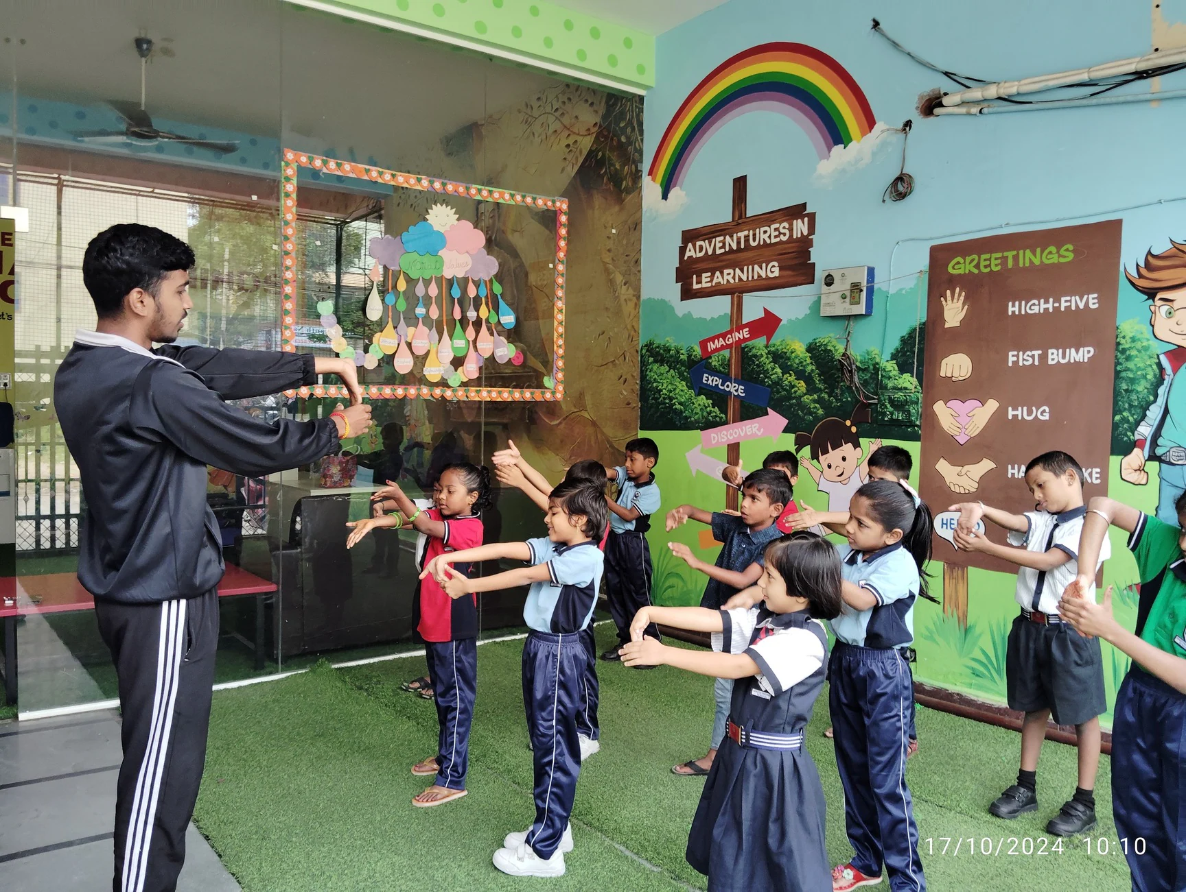 Children practising greetings and social skills in a group circle